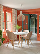 rick rack orange curtains in an orange and teal dining room